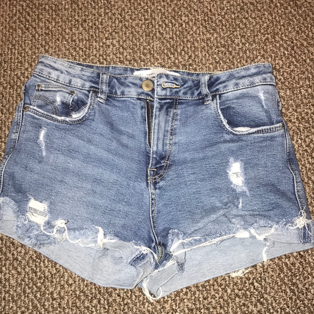 Zara Trafuluc distressed denim shorts
